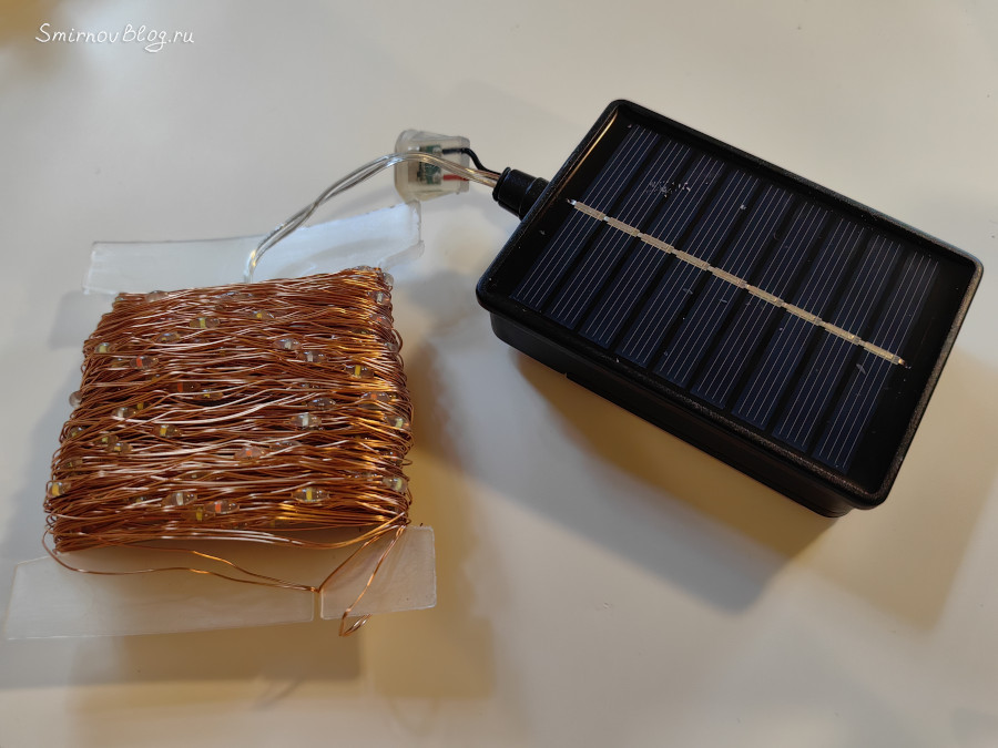 Уличная гирлянда на солнечной батарее с возможностью зарядки от блока питания для мобильного телефона Уличная гирлянда на солнечной батарее с возможностью зарядки от блока питания для мобильного телефона